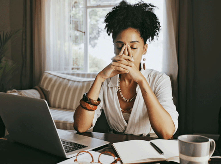 Woman at work struggling with mental health
