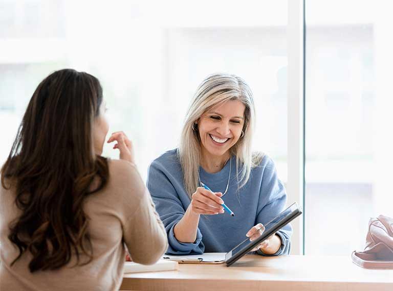 Two healthcare managers having a meeting