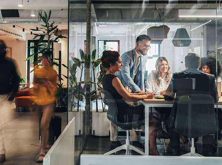 Team talking in meeting room