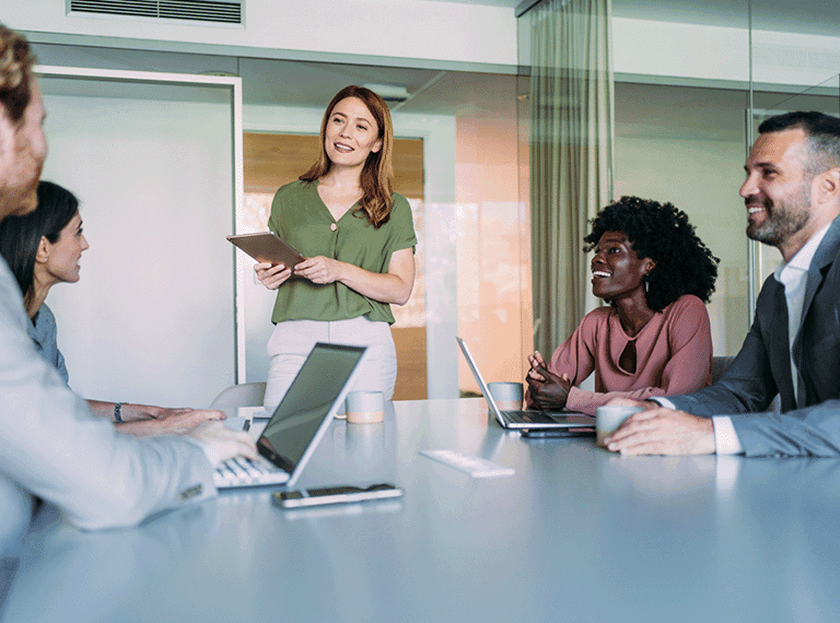 Group of employees discussing project
