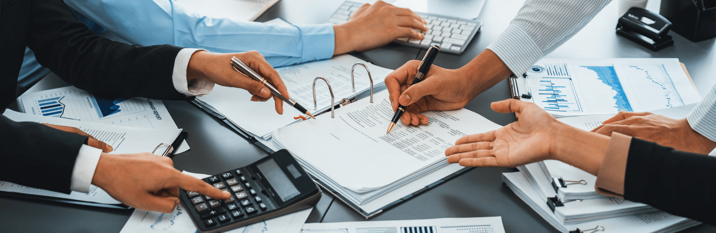 Management Accountant co-workers smiling - Reed Learning